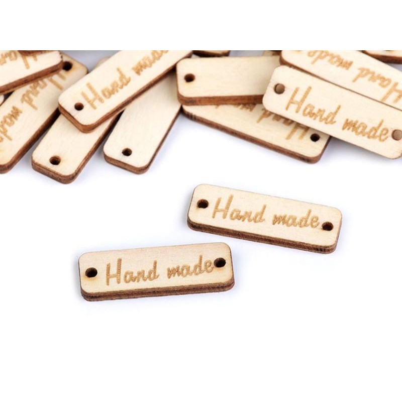 Ivoorkleurig label  "hand made"