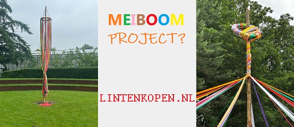 Versierde Meiboom met kleurrijk satijnlint